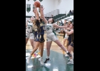 ISABELLE LORENZONI (#25, right) battles with the Roscommon players for a rebound on Monday. --Journal Photo