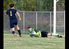 JACOB REDER (#1) steals another potential goal by SSC last Tuesday. Reder’s 12 saves were key to Pinconning’s 2-1 win. --Journal Photo