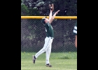 JEAN BRAZEAU (#10) makes the catch in left to rob the Flying G’s of an extra-base hit. The Spartans beat Gladwin in both of Thursday’s games. --Journal Photo