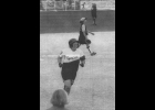 JENNY MACKSON approaches third base during her state championship-winning home run while Wyoming Rogers shortstop and fielder walk off the field --Journal Photo and caption from June 21, 2000
