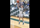 JIMMY BELLOTTIE (#5, right) hit three 3-pointers on Friday on his way to a team-leading 16 points on the road at Harrison. --Journal Photo