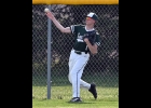JORDAN GUNTER (#1) throws the ball to the cut-off man from the fence in right against Meridian. --Journal Photo