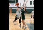 JORJA GAUTHIER (#22) led the Spartan Girls Varsity with 8 points in their season opening loss to the Clare Pioneers, 20-63, at home on Monday evening. It was the first day that competition in Winter “contact”sports was allowed in Michigan.      										--Journal Photo