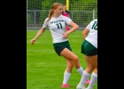 JOSIE WIELAND (#11) passes the ball during the Spartans’ game against Millington. --Journal Photo