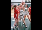 JOSIE WIELAND (#11) grabbed a rebound before taking this shot in lat Tuesday’s win over the Whittemore-Prescott Cardinals. --Journal Photo