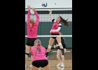 KAIA BILLINGSLEY (#3, right) up for a kill against Farwell last Wednesday. The Girls won in three straight. --Journal Photo