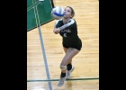 KALLIE BLAKE (#5) comes out the side to save a ball if last week’s loss to Clare. --Journal Photo