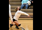 KATIE DAFOE (#4) gets the dig against Clare last Wednesday. The Spartans fell to the Pioneers, 1-3. 					           --Journal Photo