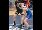 KENNEDY CLOUTIER, wrestling at 126 pounds, won her match against Beaverton last Wednesday. --Journal Photo