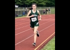 KINSIE JACQUES (left) ran away to a 18 second win in the 3200 Meters with a Personal Record 12:14.84 at the MHSAA Region 21-3 meet at East Jordan High School on Saturday. This qualified the Freshman for her second State Finals appearance of the year after she went to the Cross Country finals in November. --Courtesy Photo