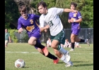 LANDEN ENCISO (#13) battles the Bay City Central player for possession during last week’s 2-0 loss to the Wolves. --Journal Photo