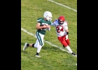 Landin Bargeron (#20) hauled in this pass but got hit immediately, holding on for a 26 yard gain on Friday night.