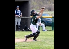 LANDON GAGE tracks down a popup in the second game on Saturday. The Freshman was impressive behind the plate for both games. --Journal Photo