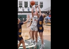 LAYLA FOCO (#21) drives into the paint for 2 of her 16 points against Shepherd last Thursday. She also grabbed 16 rebounds.
