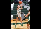 LAYLA FOCO (#21) shoots for a 3-pointer against Clare last week. --Journal Photo