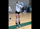 LEXI DROUSE (#6, right) bumps the ball up against Meridian. --Journal Photo