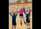LEXI DROUSE (#6) battles the Mustangs front line in last week’s loss to Meridian. --Journal Photo
