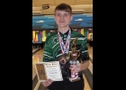 LOGAN MILLIMAN (right) shows off his hardware after claiming First Place in the Jack Pine Conference Singles Tournament on Saturday. He also grabbed a medal from the Mid-Winter Tourney, a Second Team All-Conference nod.--Courtesy Photo