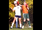 LUCAS STONEBACK (#11) blocked this shot without hitting the Panther player on Monday. He was in the net for the complete game and made 34 saves in the 3-5 loss to Standish Sterling Central. --Journal Photo