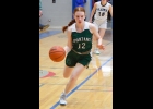 MACKENZIE EILF (#12) brings the ball up on a breakaway against Gladwin on Friday. --Journal Photo