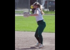 MADDY SHOULTES (#21) fires the ball to first for the out against Meridian last Thursday.       --Journal Photo