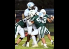 Max Cianek (#52), shown on the Spartan roster as 5’11” and 224 pounds, shows the size advantage of the Cougars in Thursday’s game.