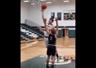 NATE LAURES (#32) got on to the court for the first time this season, scoring 4 points and grabbing 4 rebounds last Tuesday. --Journal Photo