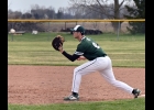 NATE LAURES (#9) waits for the throw at first. He threw only 1 inning in the second game against Farwell on Tuesday but claimed the win. --Journal Photo