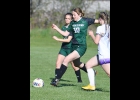 NEVAEH HARRINGTON (#10) clears the ball from the Spartan end on Monday. --Journal Photo