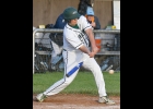 OLIVER CIANEK (#7) lines up for the hit against Meridian last Tuesday. --Journal Photo