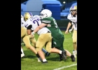 OWEN MURRAY (#52) takes down the Eagles ball carrier at the line in last Friday’s Homecoming game