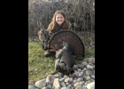 Paige Pomaville, (above) age 9, shot this turkey with a 8 1/4 inch beard, in Arenac County while hunting with Dad. --Courtesy Photo