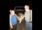 Skyler Pomaville shoots his first buck, a 7 point, with grandpa Leonard Pomaville. --Courtesy Photo
