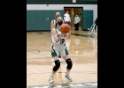 SENIORS RAYNE WILSON (#12) and JORJA GAUTHIER (#22) (at the free throw line earlier in the year) finished their Spartan basketball careers in the MHSAA District 71 Semi-Final match against Beaverton on Wednesday. --Journal Photo
