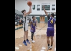 RYAN KOWALCZYK (#23) came off the bench late and made the most of it, dropping his only shot for 2 additional Spartan points. --Journal Photo