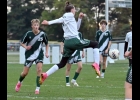 RYAN KOWALCZYK (#21) leaps to clear the bouncing ball in last Wednesday’s District loss to Freeland. --Journal Photo