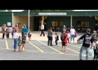 CENTRAL ELEMENTARY PRINCIPAL JOHN SANFORD talks to parents on the first day of school, to explain that each grade has a separate door to enter and exit the school this year. --Journal Photo