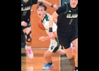 SEAN DONAHUE (#3), turns up the court after one of his 5 steals in Pinny’s 60-29 win over Clare last Wednesday.