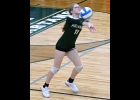 SHELBY VOLDERS (#11, right) bumps the ball up from the back line in last Wednesday’s match against Clare. --Journal Photo