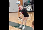 SHELBY VOLDERS (#11) the Spartans’ Libero, sends the ball forward against Ogemaw Heights on Saturday. --Journal Photo
