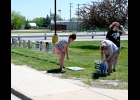 PINCONNING EDUCATION ASSOCIATION members supported the PHS class of 2020 by purchasing signs identical to those provided to graduates by community members and placing them in front of the school on Tuesday afternoon. --Journal Photo