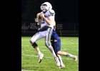THADDEUS NASHATKA (#2, above) pulled in this 34-yard pass, rushed for 103 yards and a TD, and made 3 tackles and an interception in Friday’s loss to Valley Lutheran. --Journal Photo