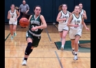 TORI SHARK (#23) takes one of her steals down for 2 of her 11 points against Clare. --Journal Photo