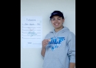 TORI SHARK poses with her second-place medal at the MHSAA Region 20 Girls Golf Championship at Eagle Glen in Farwell last Tuesday.        --Courtesy Photo
