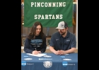 TORI SHARK signs her National Letter of Intent to play golf for the Northwood University Timberwolves as Coach (and dad) Eric looks on. --Journal Photo