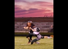 TRISTAN DYCEWICZ (#15) takes down the Whittemore-Prescott ball-carrier early in Fridays game. The red sky may have been a delight for sailors, but not for the Spartans as they led going into the fourth quarter but fell to the Cardinals 42-36 to close out the season. --Journal Photo