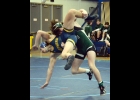 TYLER BROOKS comes off the ground as he dumps his opponent in the JPC Tournament. --Courtesy Photo