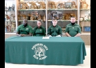 PHS SENIOR JACOB BROOKS, who recently recorded his 100th win as a Spartan wrestler, signed a National Letter of Intent on March 3rd, to wrestle for the Adrian College Bulldogs. Brooks placed took First Place in the 2020 MHSAA Division 9-3 160-pound weight class to qualify for last year’s Individual State Finals. He’s joined here by his mother and Coaches Alfonzo Thomas (left) and Wayne Purtell (right). Brooks is the first Spartan grappler to pin down an athletic scholarship in more than 10 years.