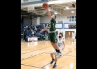 ZACH JOHNSON (#21) makes the breakaway look easy in last Tuesday’s 40-61 road loss to Meridian. --Journal Photo