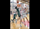 ZACH LAURES (#5, above) comes across the baseline for a shot against Beaverton --Journal Photo